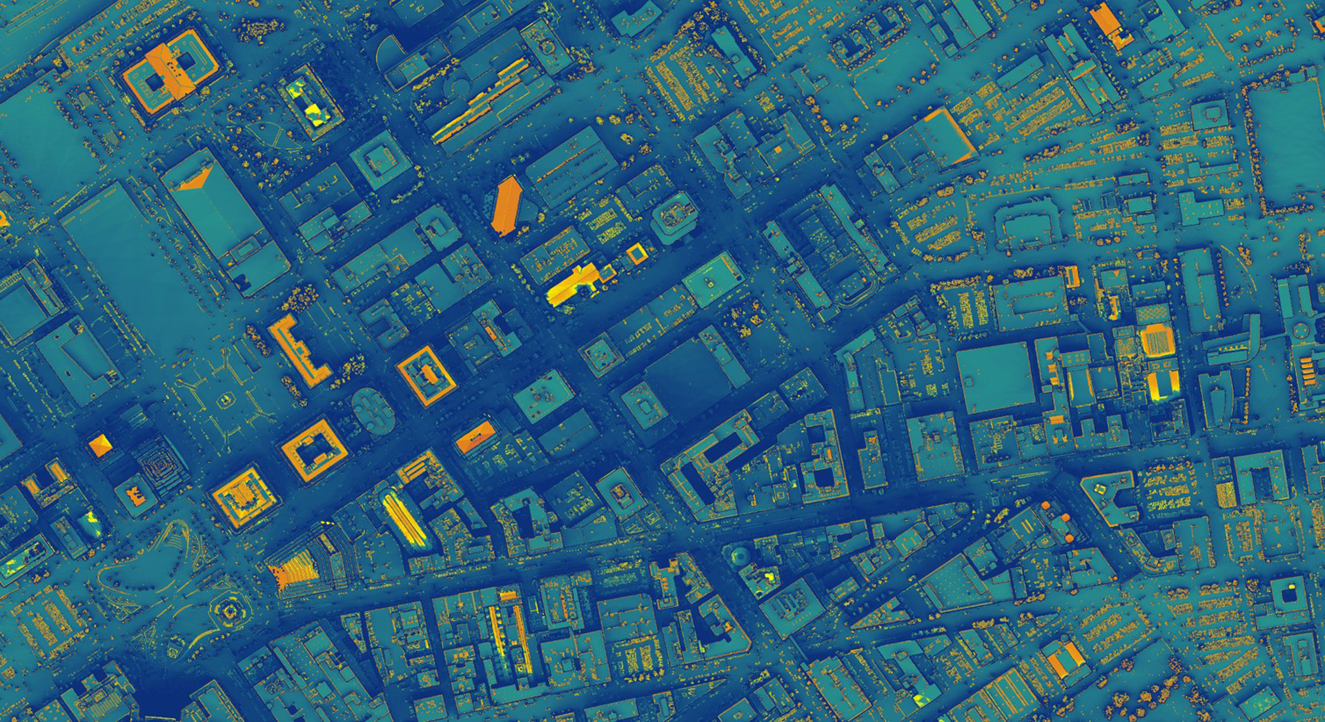 Annual solar energy generation potential calculated using NASA POWER (preprocessed CERES and MODIS data from the Aqua and Terra satellites) in downtown Cleveland, OH. Solar irradiation data are averaged over 22 years (1983 to 2005). LiDAR data were used to model shadowing and the number of sunlight exposure hours per year. Warm colors indicate high solar energy generation potential per square foot. Unshaded rooftops with slopes and aspects that correspond with local solar geometry are optimal for installing solar panels.
