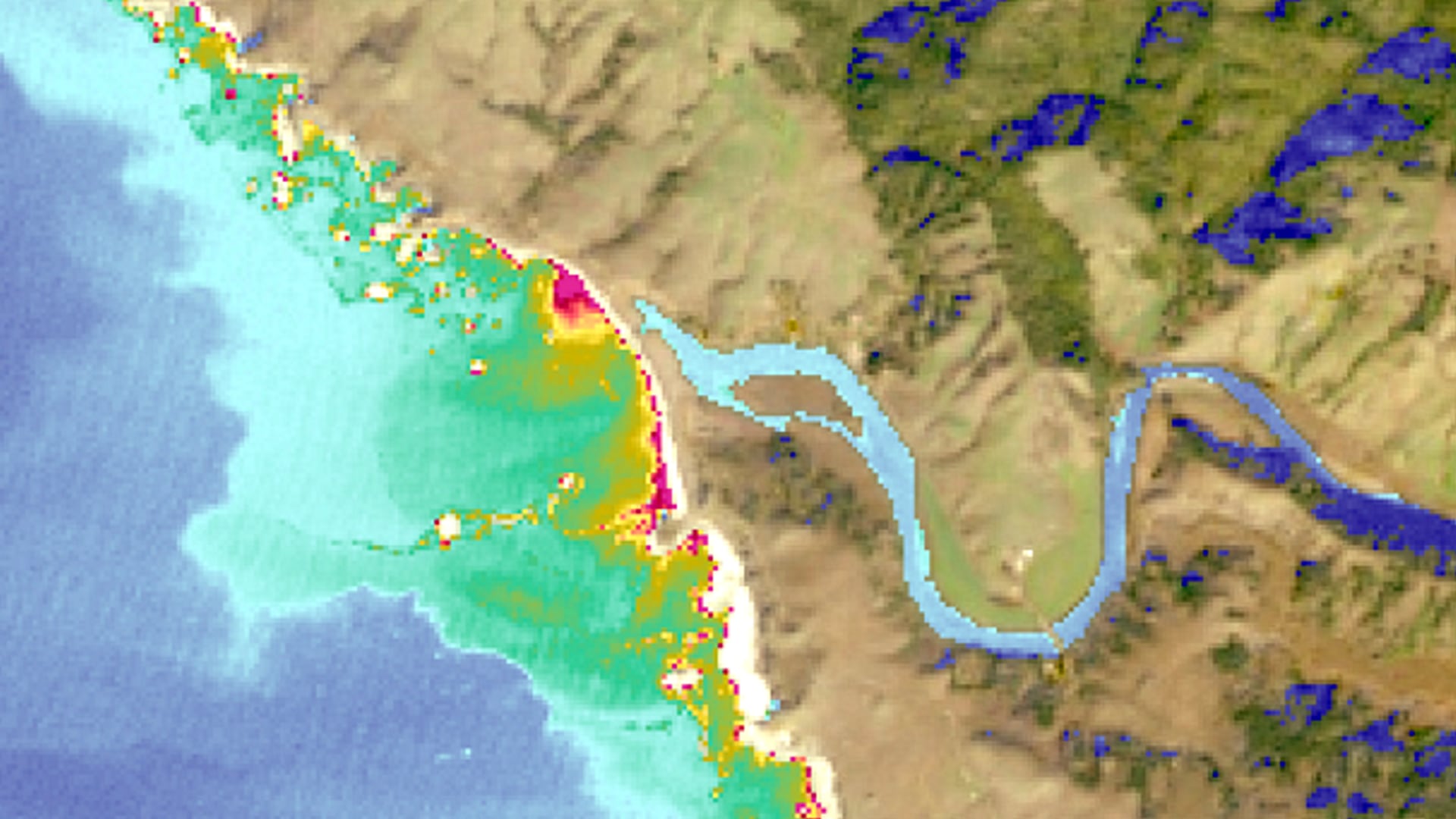 Turbidity calculated from Landsat 8 OLI imagery taken 01/23/2021 over Russian River, California. A turbidity algorithm was applied to visualize water quality and mask out land. In areas of water, red indicates high turbidity and blue indicates low turbidity. Land is displayed with a true color band combination (4, 3, 2) where dark blue indicates shadow. As turbidity can indicate poor water quality, visualization informs conservation agencies on estuary conditions.Keywords: Image created by Roger Ly. Keywords: turbidity, water quality monitoring, California, estuary