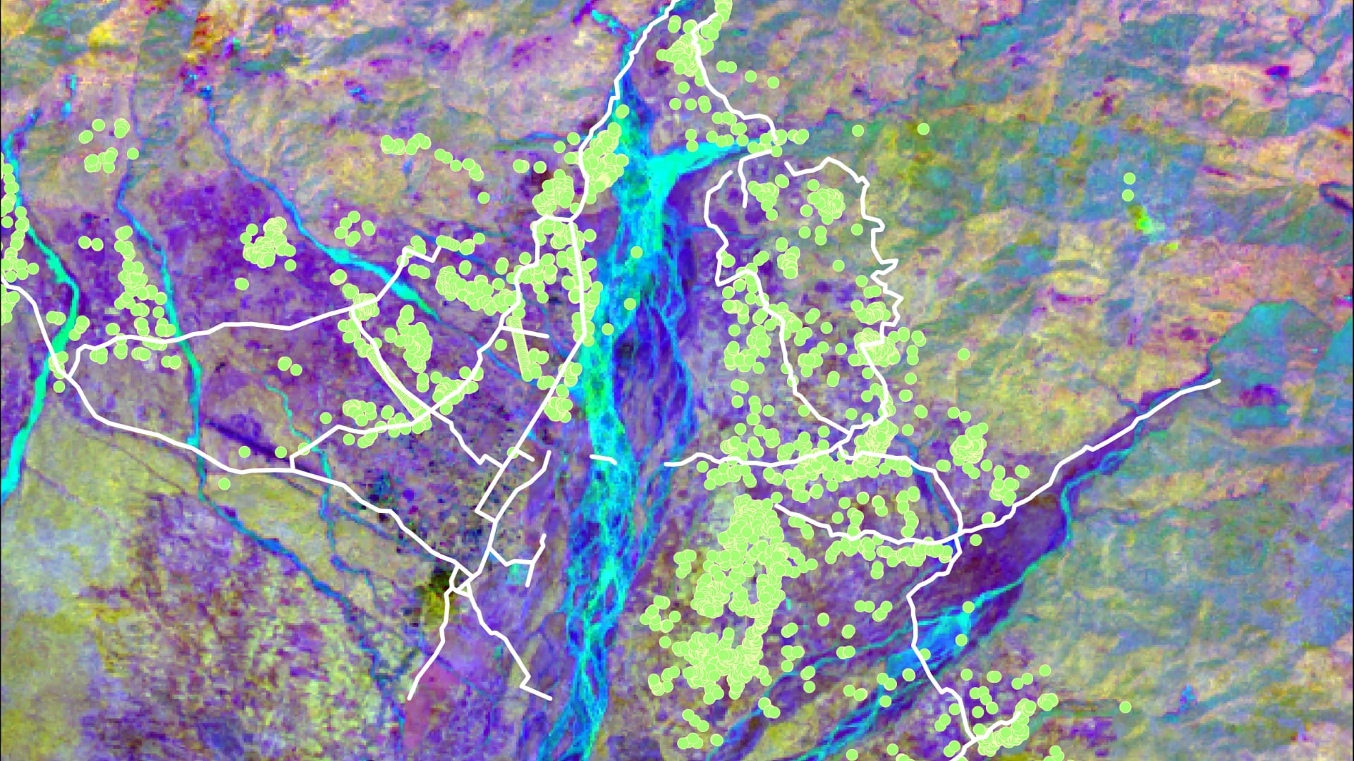 2020 Landsat 8 OLI data processed using principal component analysis with a band combination of 2, 3, and 9. Human settlements and roads are indicated by the green dots and white lines, respectively. The area displayed is the town of Gelephu along the southern border of Bhutan. Different colors represent different land cover types. This will provide information on land change trends which will assist partners in urban planning and allocation of wildlife corridors.Keywords: remote sensing, Asian elephant habitat, Bhutan, LULC change mapping, LULC change forecasting, wildlife corridor mapping