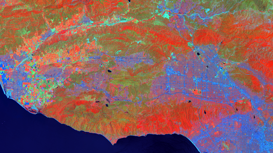 False color composite of the Santa Monica Mountains. Brighter red hues are associated with more vigorous vegetation canopies, green hues are associated with less vegetated areas, and deeper blues are associated with built-up areas and impervious surfaces. Image credit: Santa Monica Mountains Ecological Forecasting III team, NASA DEVELOP